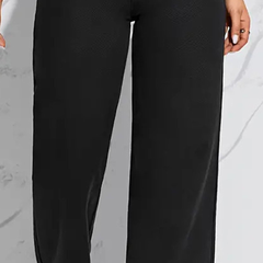 Women's black straight fit high-rise stretchable jeans.